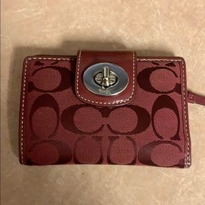 Burgundy Coach wallet with silver hardware